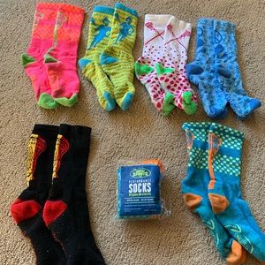 7 pairs of Chalk Talk Lacrosse socks with lacrosse designs